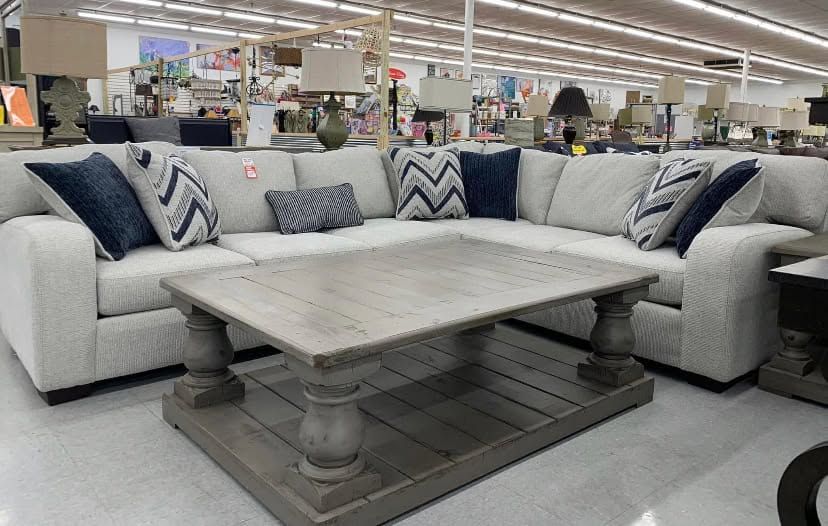 Seating and home furnishings inside an 82 Outlet warehouse